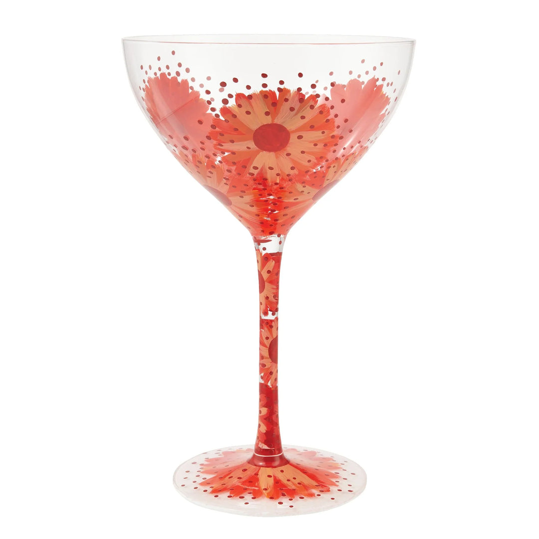 Cocktail glass with red flowers